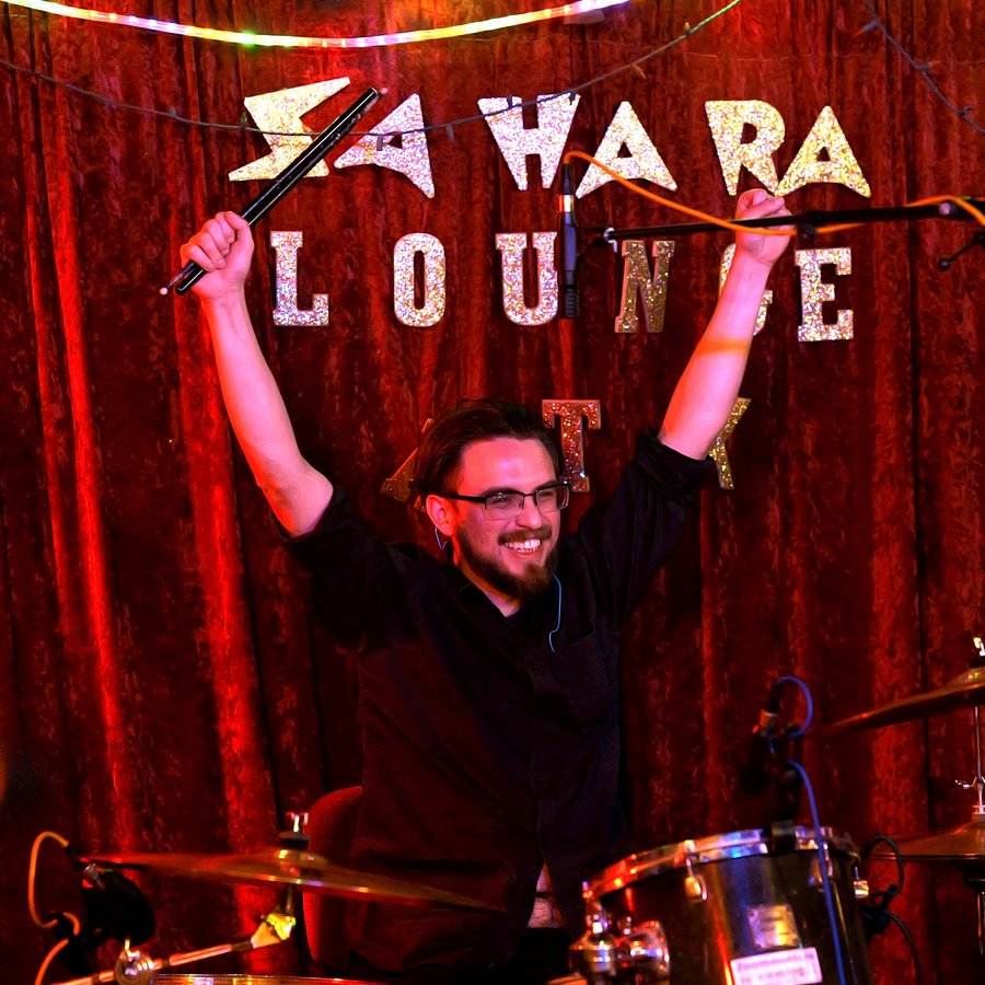 Cameron 'Troy Peoples' Arnold — drums